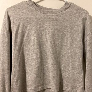 Grey long sleeve, daisies on sleeve